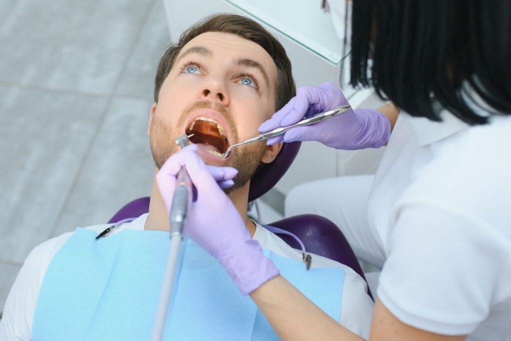Patient receiving emergency dental care treatment.