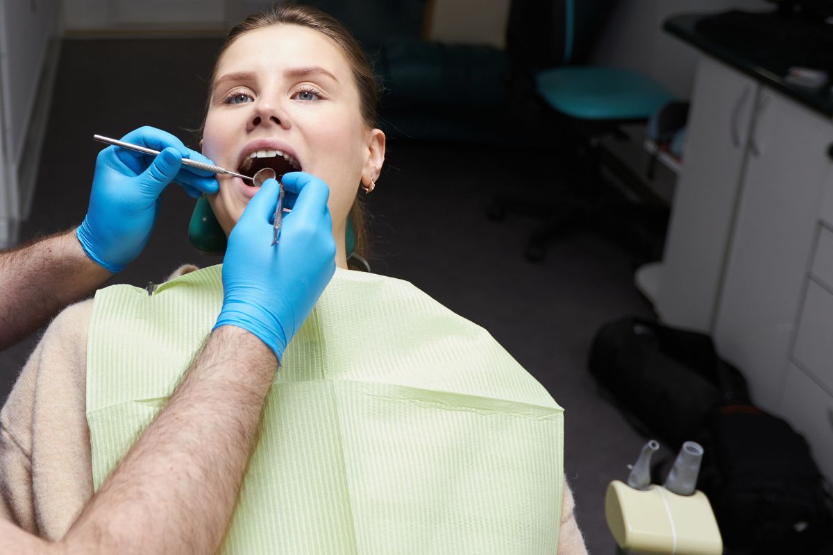 Patient receiving a routine dental checkup.