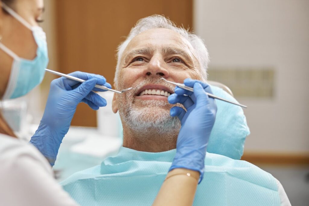 Patient having a routine dental checkup for preventive oral care.