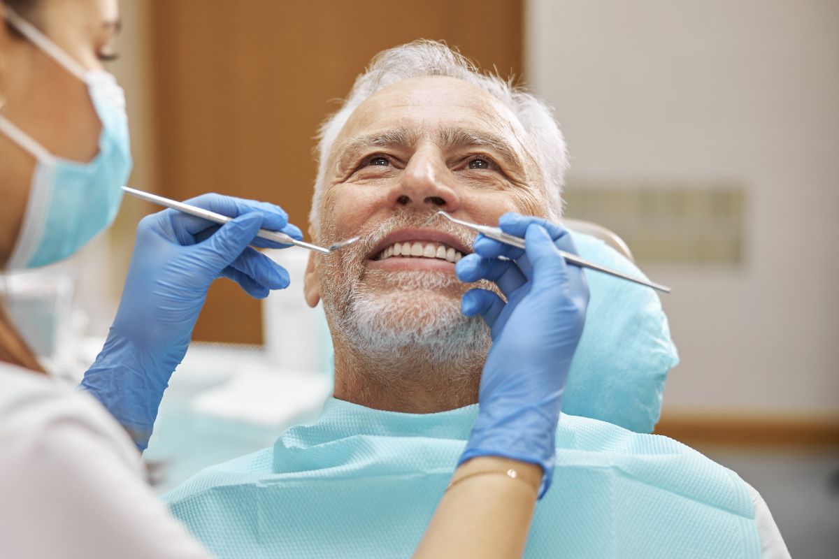 Patient having a routine dental checkup for preventive oral care.